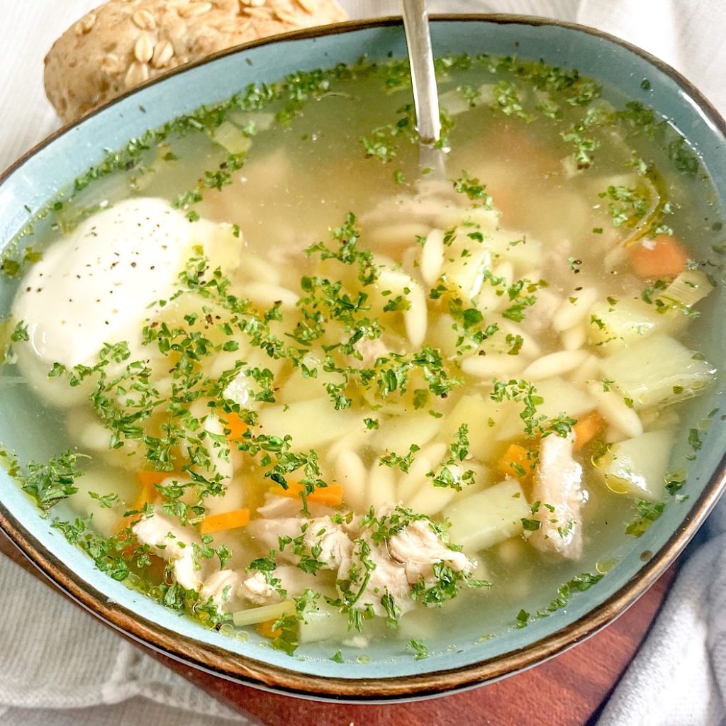 Soup on rich Pork bones stock with vegetables and orzo pasta