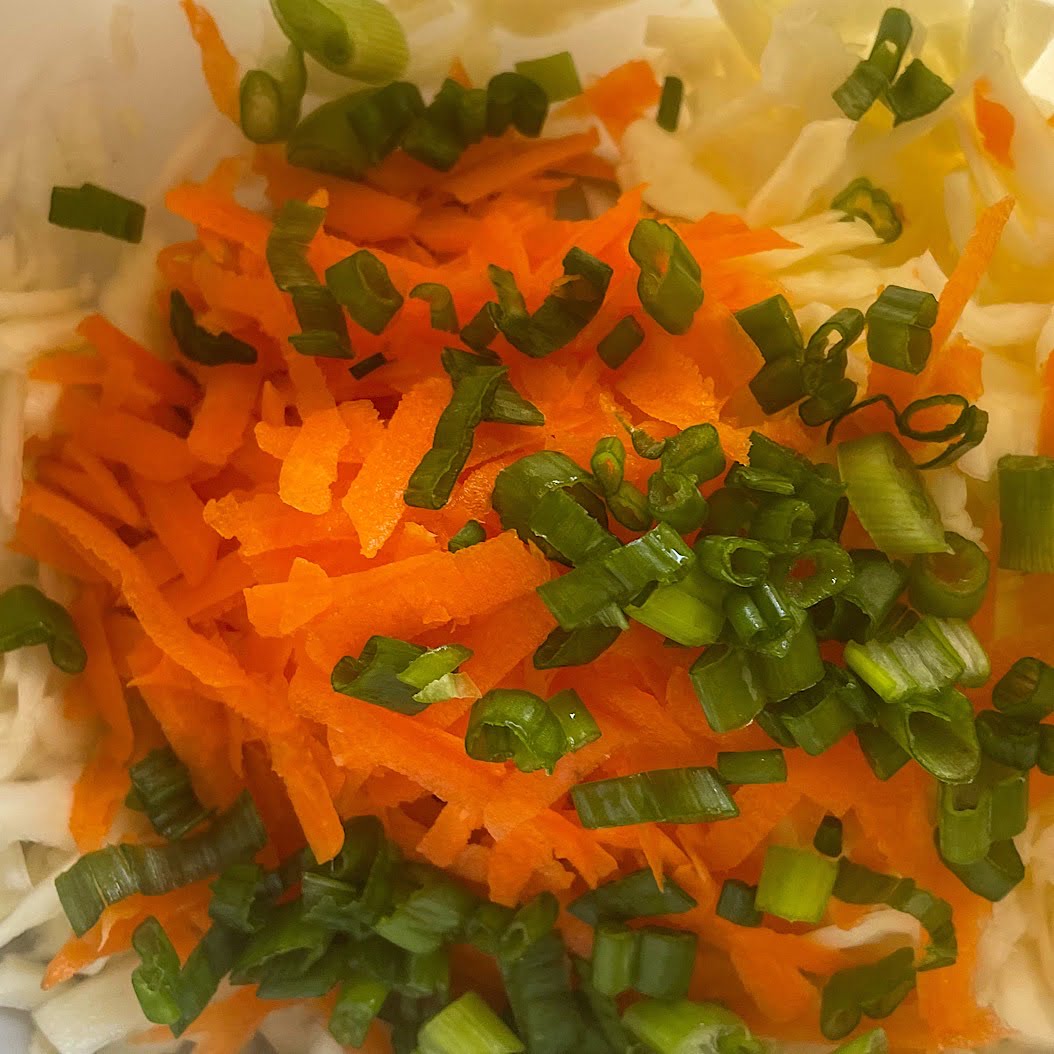 Close-up of Russian coleslaw salad with cabbage and carrots