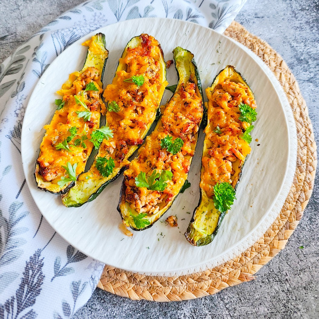 Stuffed courgettes with turkey mince and herbs, ready to serve.