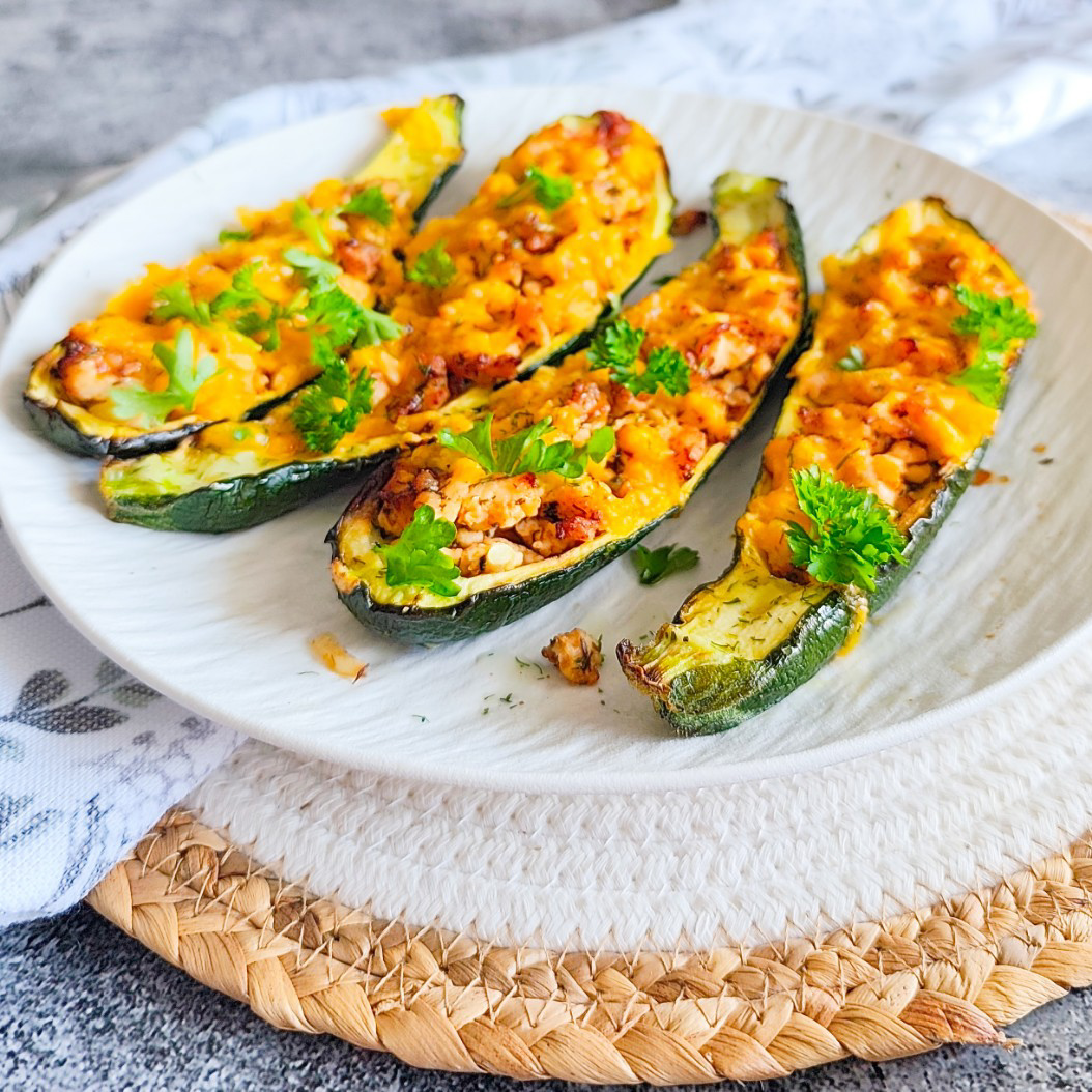 Stuffed courgettes with turkey mince and herbs, ready to serve.