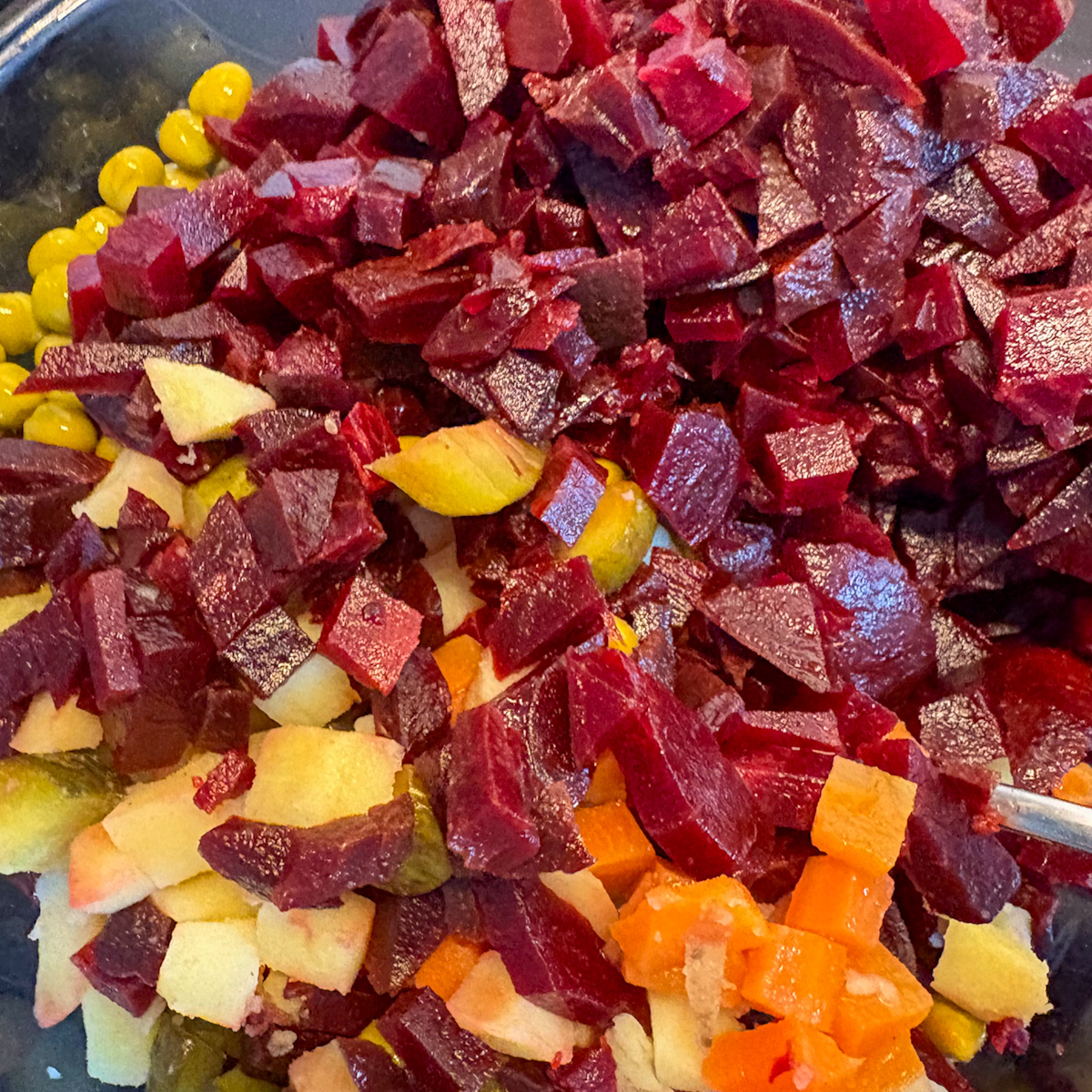 Diced beetroot, carrots and potatoes for Russian vinaigrette salad