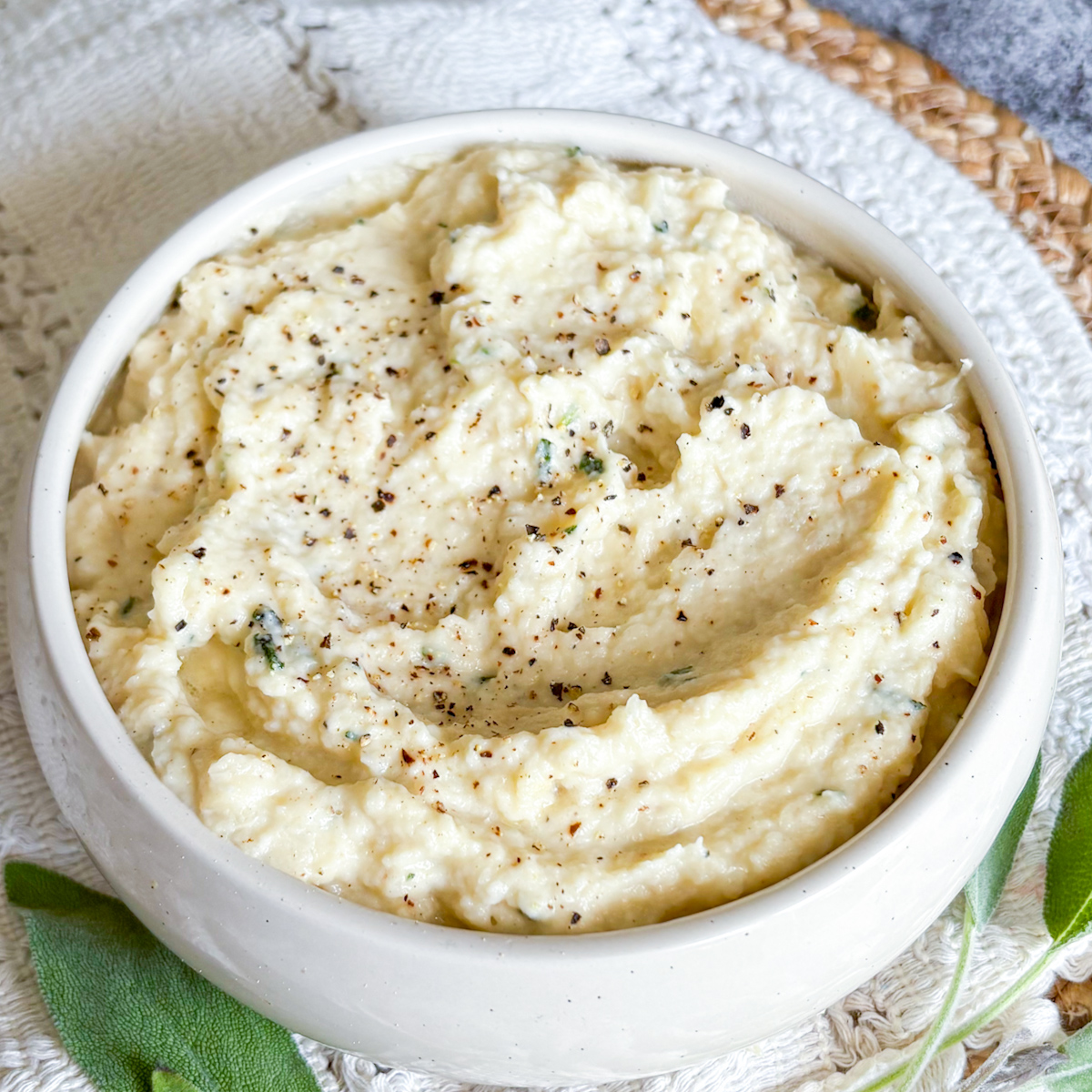 Silky celeriac purée with sage butter served in a rustic bowl