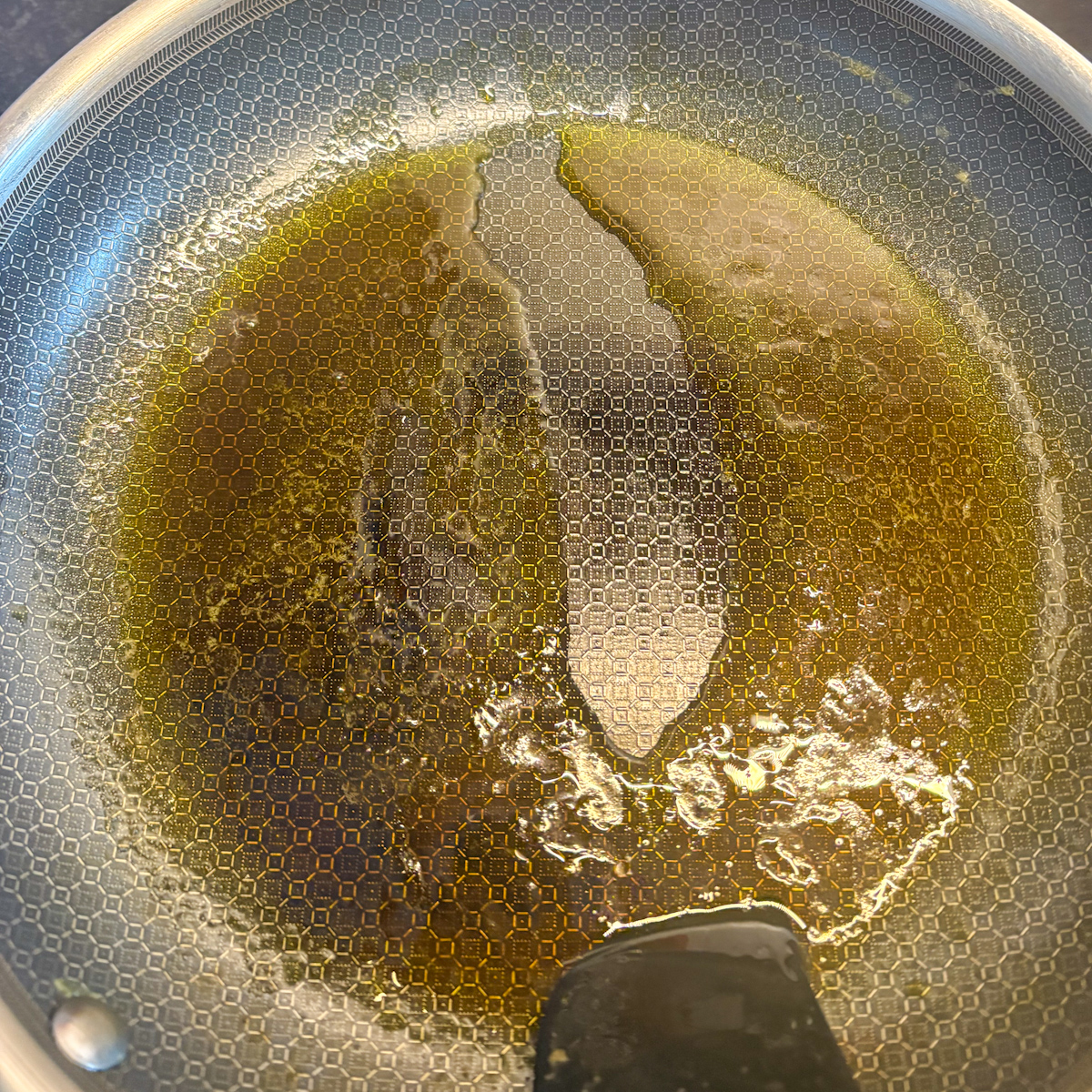 Reduced cooking liquid in skillet for the braised beetroot glaze, step-by-step process photo.