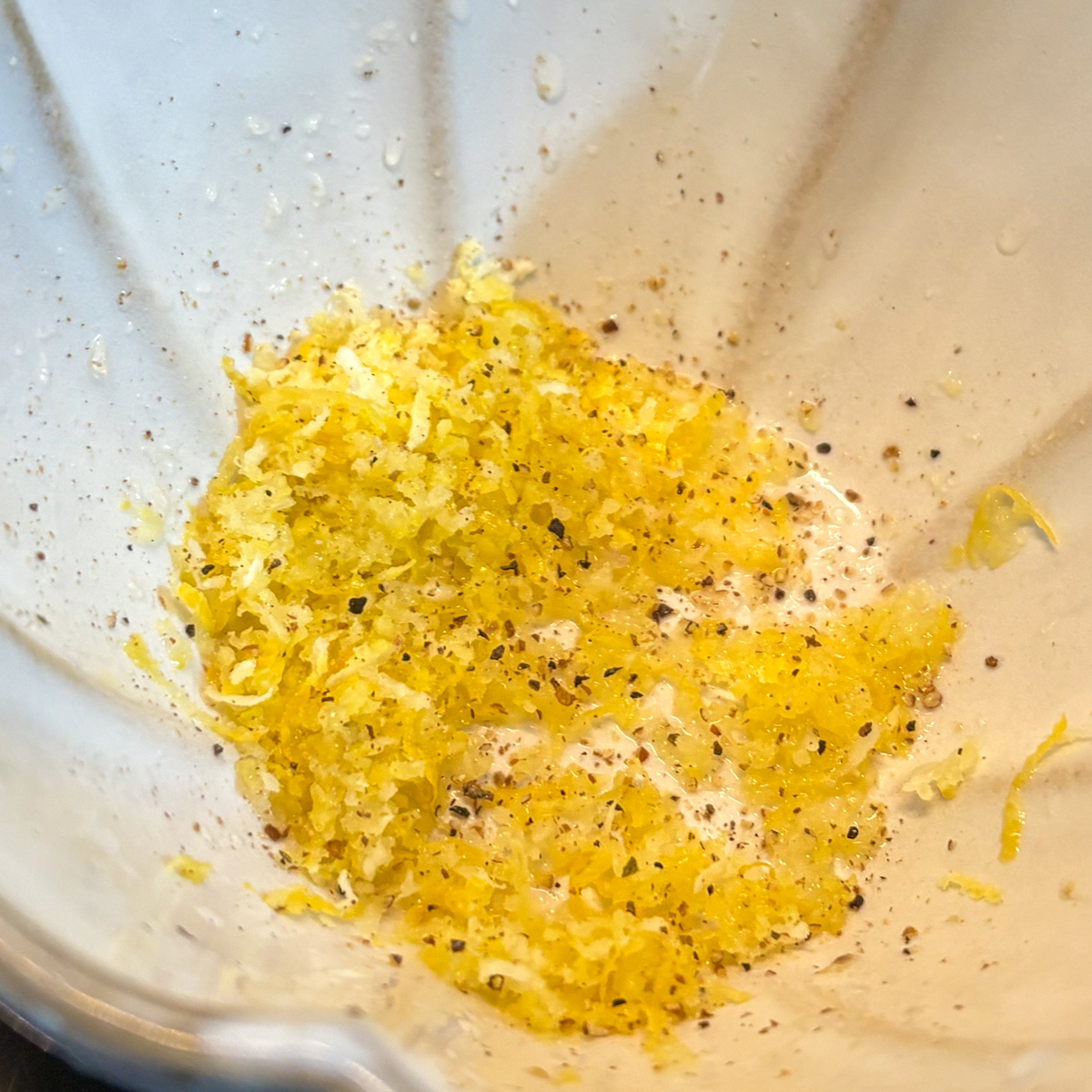 emon zest, lemon juice and black pepper mixed in a small bowl for pan-steamed asparagus recipe.