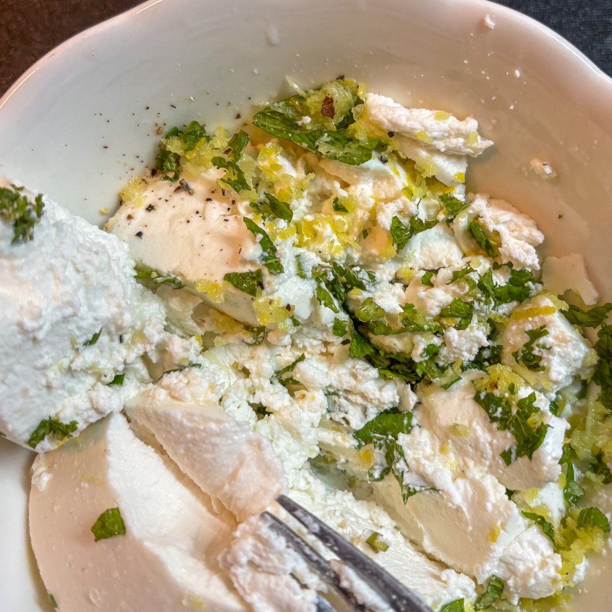 Ricotta mixed with mint and lemon zest for peas with bacon and ricotta