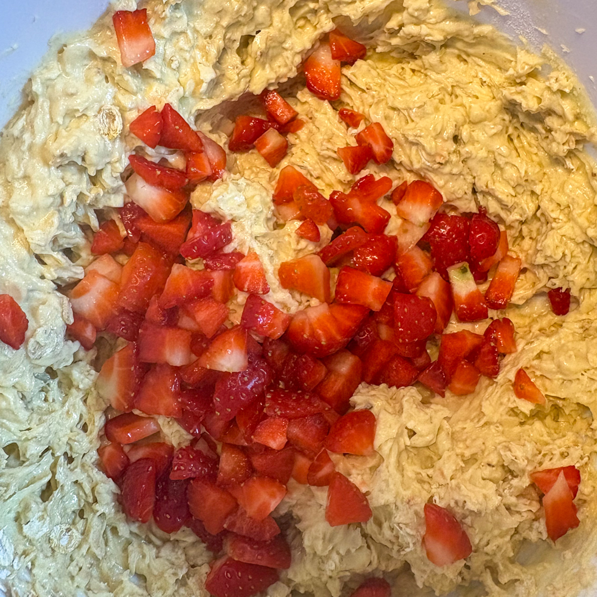 Strawberry oatmeal cookie dough with chopped fresh strawberries folded in